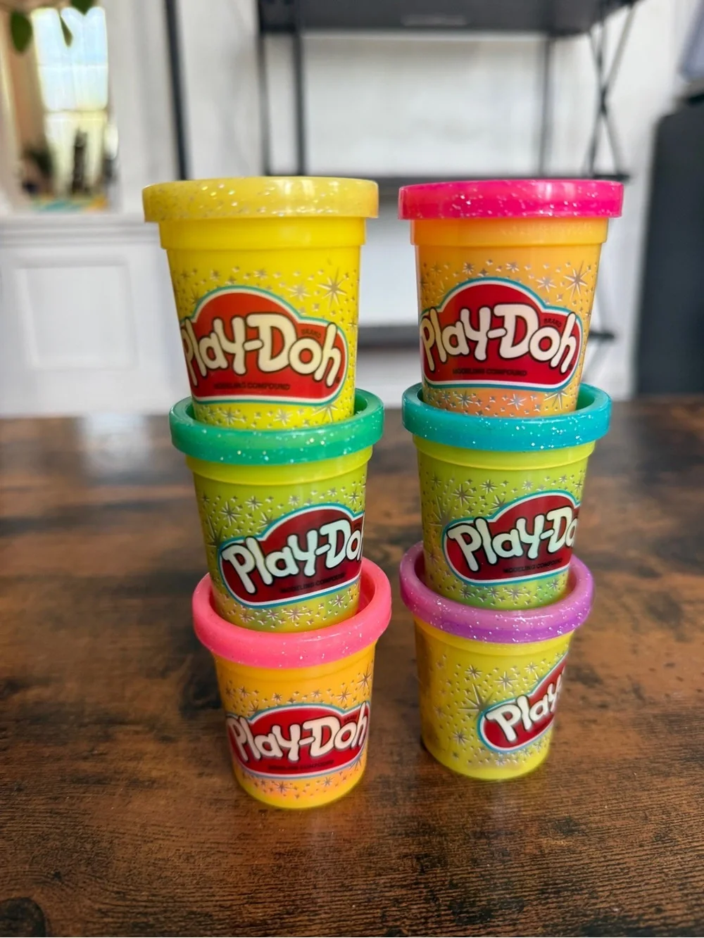 Play-Doh small Yellow with Pink, Teal, Purple, and Green Lids comes with all